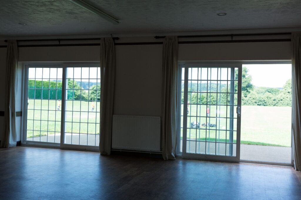 Picture of the two patio doors looking out onto the playing field