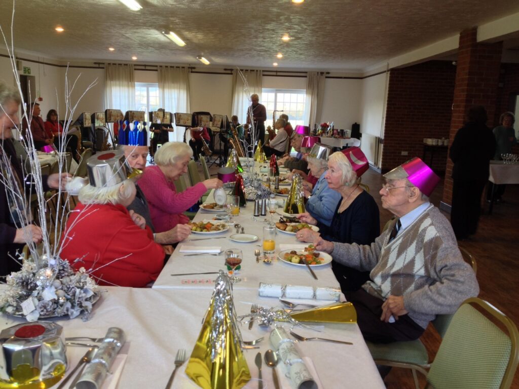 The hall with a Christmas Dinner in progress